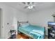 Cozy bedroom featuring a ceiling fan and hardwood floors at 341 Waterwheel Falls Dr, Henderson, NV 89015
