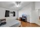 Spacious bedroom with a ceiling fan and hard surface floors at 341 Waterwheel Falls Dr, Henderson, NV 89015