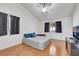 Bedroom featuring natural light, ceiling fan, and hard surface floors at 341 Waterwheel Falls Dr, Henderson, NV 89015