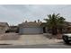 Charming single-story home with a well-maintained front yard and a two-car garage at 341 Waterwheel Falls Dr, Henderson, NV 89015