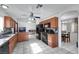 Bright kitchen with appliances, tile flooring and view into the dining area at 341 Waterwheel Falls Dr, Henderson, NV 89015