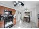 Modern kitchen featuring a gas range, microwave, and view to backyard at 341 Waterwheel Falls Dr, Henderson, NV 89015