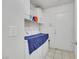 Functional laundry room with modern washer and dryer at 341 Waterwheel Falls Dr, Henderson, NV 89015