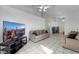 Spacious living room with tile flooring and an open layout at 341 Waterwheel Falls Dr, Henderson, NV 89015