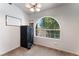 Bedroom featuring a large arched window offering ample natural light at 3420 Winterhaven St # 202, Las Vegas, NV 89108