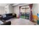 Comfortable living room with access to a private patio through large sliding glass doors at 3420 Winterhaven St # 202, Las Vegas, NV 89108
