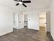 Bright bedroom with neutral walls, vinyl flooring, and ample closet space for convenient storage at 3484 Nightflower Ln # 2, Las Vegas, NV 89121