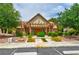 Well-maintained clubhouse with a pergola, desert landscaping, and ample parking at 3484 Nightflower Ln # 2, Las Vegas, NV 89121