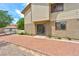 Backyard with stucco siding, a sliding glass door, and low maintenance landscaping at 3484 Nightflower Ln # 2, Las Vegas, NV 89121