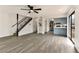 Open floor plan with new flooring, staircase and newly remodeled kitchen in view at 3484 Nightflower Ln # 2, Las Vegas, NV 89121