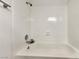 Clean and well-lit shower/tub showcasing bright white tiles and modern fixtures at 3484 Nightflower Ln # 2, Las Vegas, NV 89121