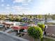 Overhead view of a home with a terracotta roof, solar panels, and covered parking in a residential neighborhood at 3625 Barcelona St, Las Vegas, NV 89121