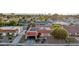 Aerial view showcasing the terracotta tiled roof, carport, and solar panels of this single-story home at 3625 Barcelona St, Las Vegas, NV 89121