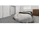 This bedroom has carpet, a bed, and double door closet at 3625 Barcelona St, Las Vegas, NV 89121