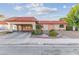 Charming single-story home featuring a terracotta tile roof and a cozy covered parking area at 3625 Barcelona St, Las Vegas, NV 89121