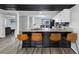 Kitchen island featuring bar seating with stone countertops and sleek black base at 3625 Barcelona St, Las Vegas, NV 89121