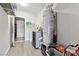 Bright laundry room equipped with washer, dryer, and large water heater at 3625 Barcelona St, Las Vegas, NV 89121
