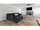 Cozy living room featuring a large sectional sofa, fireplace, and modern flooring at 3625 Barcelona St, Las Vegas, NV 89121