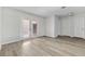 Bright living room with wood floors and french doors at 3625 Barcelona St, Las Vegas, NV 89121