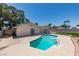 Backyard featuring pool, large patio for outdoor living, mature trees, and privacy at 3986 Belleville Ave, Las Vegas, NV 89121