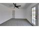 Bedroom with neutral carpet and double doors leading to outdoor space at 3986 Belleville Ave, Las Vegas, NV 89121