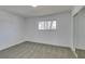 Bedroom features plush carpeting, bright window, and closet at 3986 Belleville Ave, Las Vegas, NV 89121