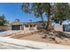 Inviting home with xeriscaped front yard and paved driveway at 3986 Belleville Ave, Las Vegas, NV 89121