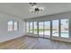 Contemporary living room with large windows offering views of the yard and pool at 3986 Belleville Ave, Las Vegas, NV 89121