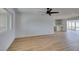 Open-concept living room with hardwood floors and ample natural light at 3986 Belleville Ave, Las Vegas, NV 89121