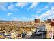 Las Vegas city view showcases a dense urban landscape featuring multiple high-rise buildings and resorts under a vibrant blue sky at 4381 W Flamingo Rd # 2220, Las Vegas, NV 89103