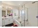 Bathroom featuring a soaking tub, walk-in shower, and double vanity, perfect for relaxation and convenience at 4780 Lorenzo Way, Pahrump, NV 89061