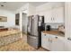Bright kitchen with stainless steel appliances and granite countertops, offering both style and functionality at 4780 Lorenzo Way, Pahrump, NV 89061