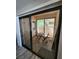 Enclosed balcony with washer/dryer and patio seating at 4805 S Torrey Pines Dr # 101, Las Vegas, NV 89103