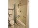 Neutral bathroom with a shower/tub combo and stacked white towels at 4805 S Torrey Pines Dr # 101, Las Vegas, NV 89103