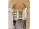 Inviting entryway with a covered archway, providing a warm welcome to residents and guests at 4805 S Torrey Pines Dr # 101, Las Vegas, NV 89103