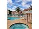 Community pool with spa, lounge chairs, and shade features at 4805 S Torrey Pines Dr # 101, Las Vegas, NV 89103