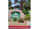 Community signage with lush landscaping, showcasing a welcoming neighborhood at 4805 S Torrey Pines Dr # 101, Las Vegas, NV 89103