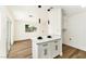 Open-concept living room and kitchen area is perfect for modern living at 5078 Mountain Vista St, Las Vegas, NV 89120