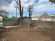 Backyard featuring a cinder block wall and gate, offering privacy and a secure outdoor space at 524 5Th St, Boulder City, NV 89005