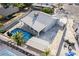 Aerial view of backyard with in-ground pool, palm trees, and covered patio area, enhancing outdoor living at 5453 Yvonne Cir, Las Vegas, NV 89122