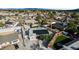 Aerial view shows well-kept home with solar panels, lush yard, and block fencing at 5453 Yvonne Cir, Las Vegas, NV 89122