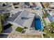 Aerial view of home featuring a pool, solar panels and artificial turf yard at 5453 Yvonne Cir, Las Vegas, NV 89122