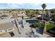 Bright aerial view of home with solar panels and updated landscape in sunny neighborhood at 5453 Yvonne Cir, Las Vegas, NV 89122