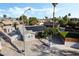 Inviting single-story home featuring detached garage, solar panels, and landscaping at 5453 Yvonne Cir, Las Vegas, NV 89122