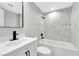 Modern bathroom with single vanity and tiled tub and shower combo at 5453 Yvonne Cir, Las Vegas, NV 89122