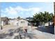Charming single-story home with solar panels, a well-maintained yard, and a welcoming facade at 5453 Yvonne Cir, Las Vegas, NV 89122