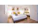 Bright bedroom with a comfortable king-size bed, mirrored closet, and a large window offering natural light at 6301 Garwood Ave, Las Vegas, NV 89107