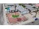 Bird's eye view of a charming home with a well-kept yard, inviting curb appeal, and a convenient attached garage at 6301 Garwood Ave, Las Vegas, NV 89107