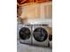 Laundry room with a modern washer and dryer and ample space for all your laundry needs at 6301 Garwood Ave, Las Vegas, NV 89107