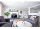 Chic living room with modern furniture, stylish decor, and a decorative fireplace at 6301 Garwood Ave, Las Vegas, NV 89107